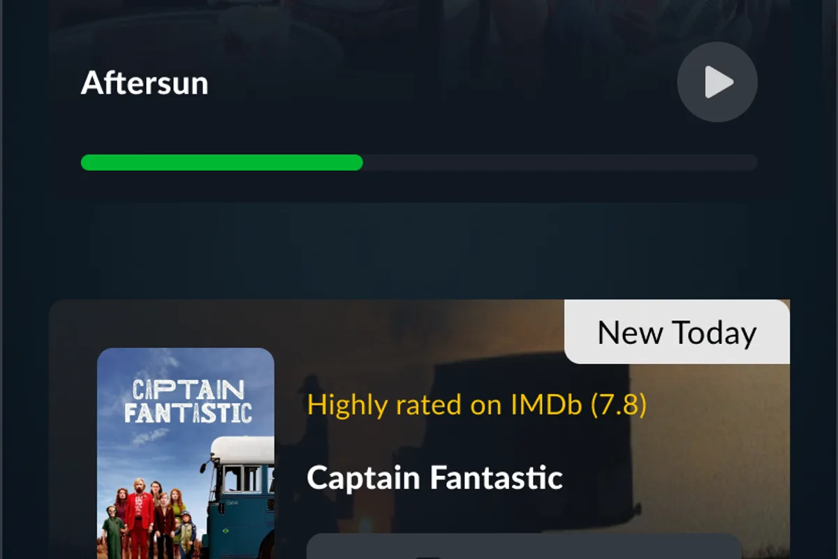 Interface officielle de JustWatch TV Plus présentant les films Aftersun et Captain Fantastic ainsi que la fonction de reprise de lecture